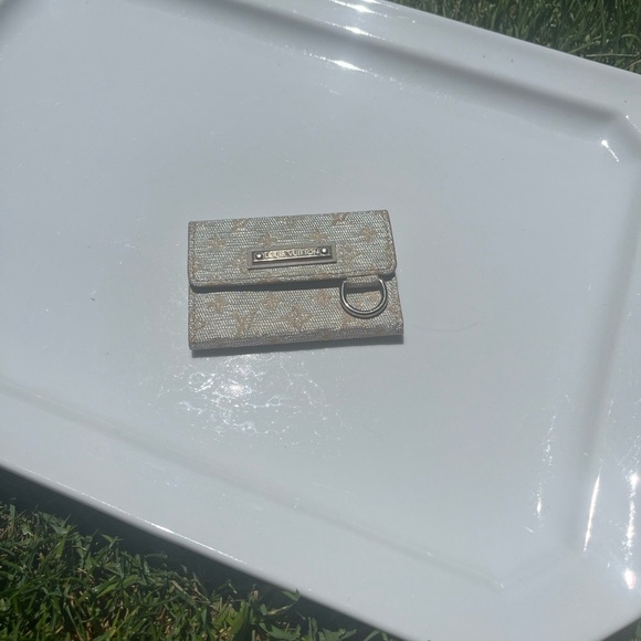 LOUIS VUITTON MINI LIN SHINE MONOGRAM WALLET - Picture 7 of 15